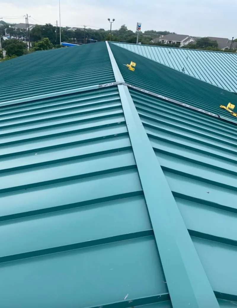 Green commercial metal roof ridge and valley for Metal Roof Repair in Nolanville